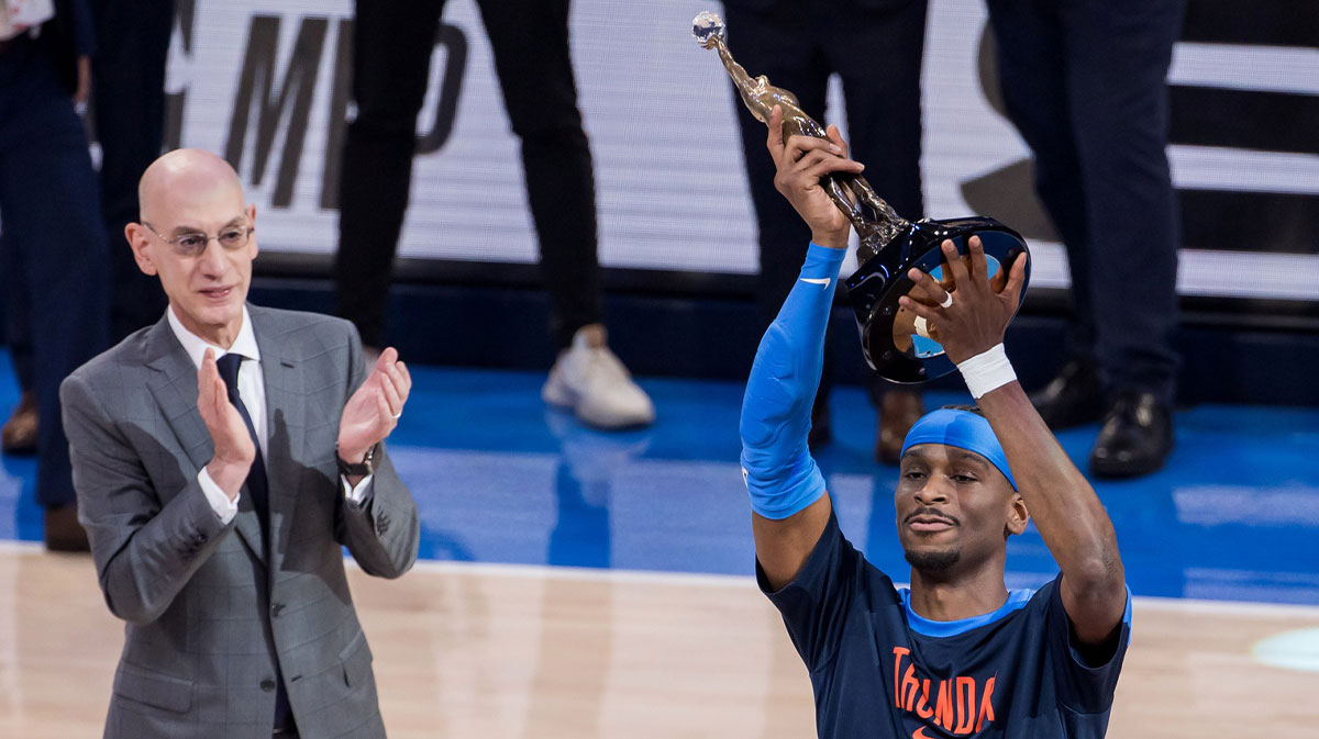 NBA commissioner is Adam Silver presents Oklahoma City Thunder guard Shai Gilgeous-Alexander (2) with the Michael Jordan Trophy for winning the most valuable player award for the 2024-25 season before game two of the western conference finals for the 2025 NBA Playoffs at Paycom Center.