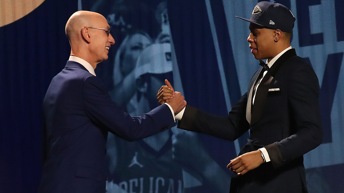 Jordan Hawkins (UConn) is greeted by NBA commissioner Adam Silver after being selected fourteenth by the New Orleans Pelicans in the first round of the 2023 NBA Draft at Barclays Arena.