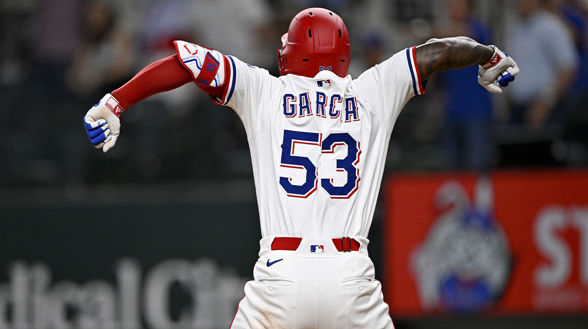 Jun 30, 2025; Arlington, Texas, USA; Texas Rangers right fielder Adolis Garcia (53) celebrates after he hits a three run home run to tie the game against the Baltimore Orioles during the tenth inning at Globe Life Field. Mandatory Credit: Jerome Miron-Imagn Images