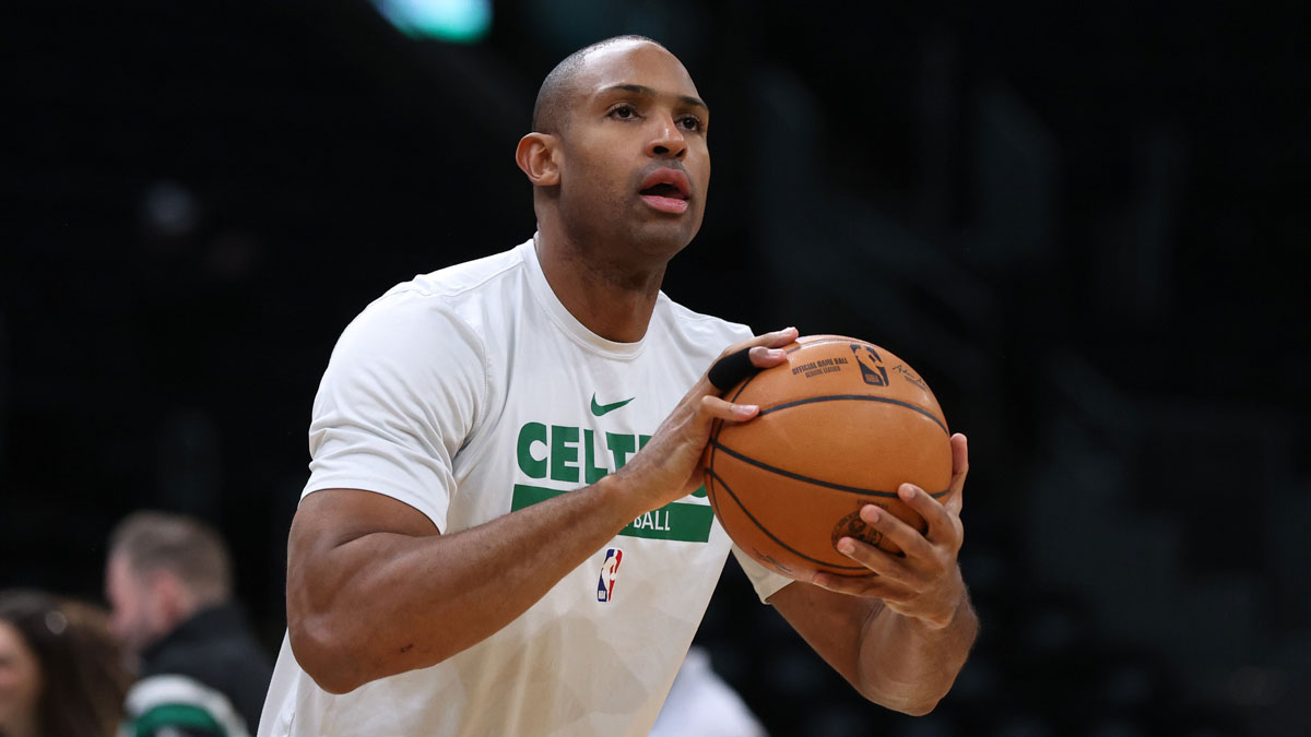 Boston Celtics center Al Horford (42) warms up before playing against the Denver Nuggets at TD Garden.