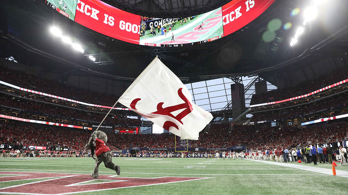 The Alabama Crimson Tide mascot waves the flag during the second quarter against the Georgia Bulldogs in the SEC championship game at Mercedes-Benz Stadium.
