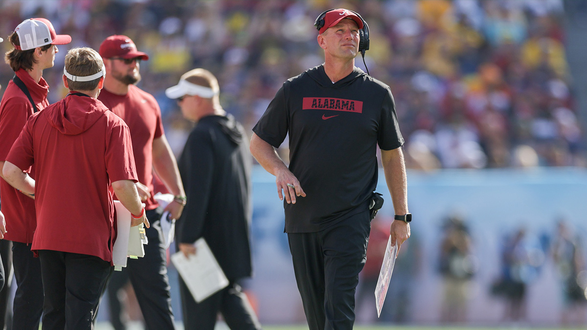 Alabama Crimson Tide head coach Kalen Deboer looks on against the Michigan Wolverines in the third quarter during the ReliaQuest Bowl at Raymond James Stadium