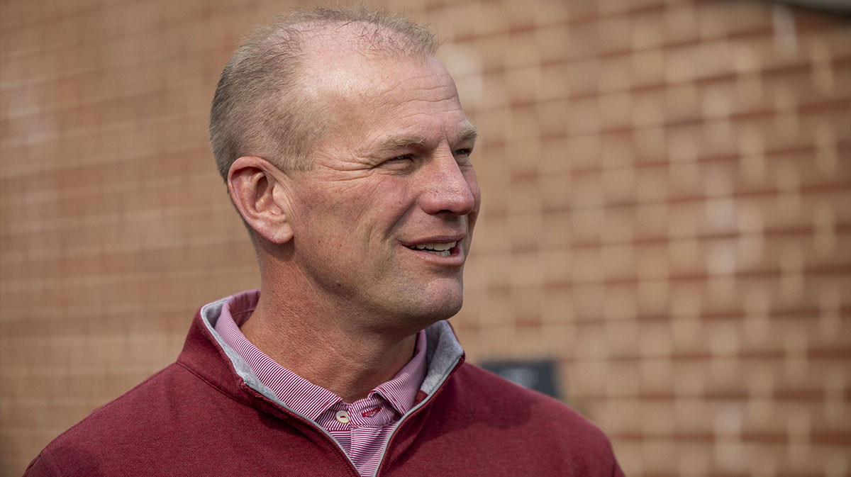 Alabama football head coach Kalen DeBoer visits the field during Senior Bowl practice for the American team at Hancock Whitney Stadium.