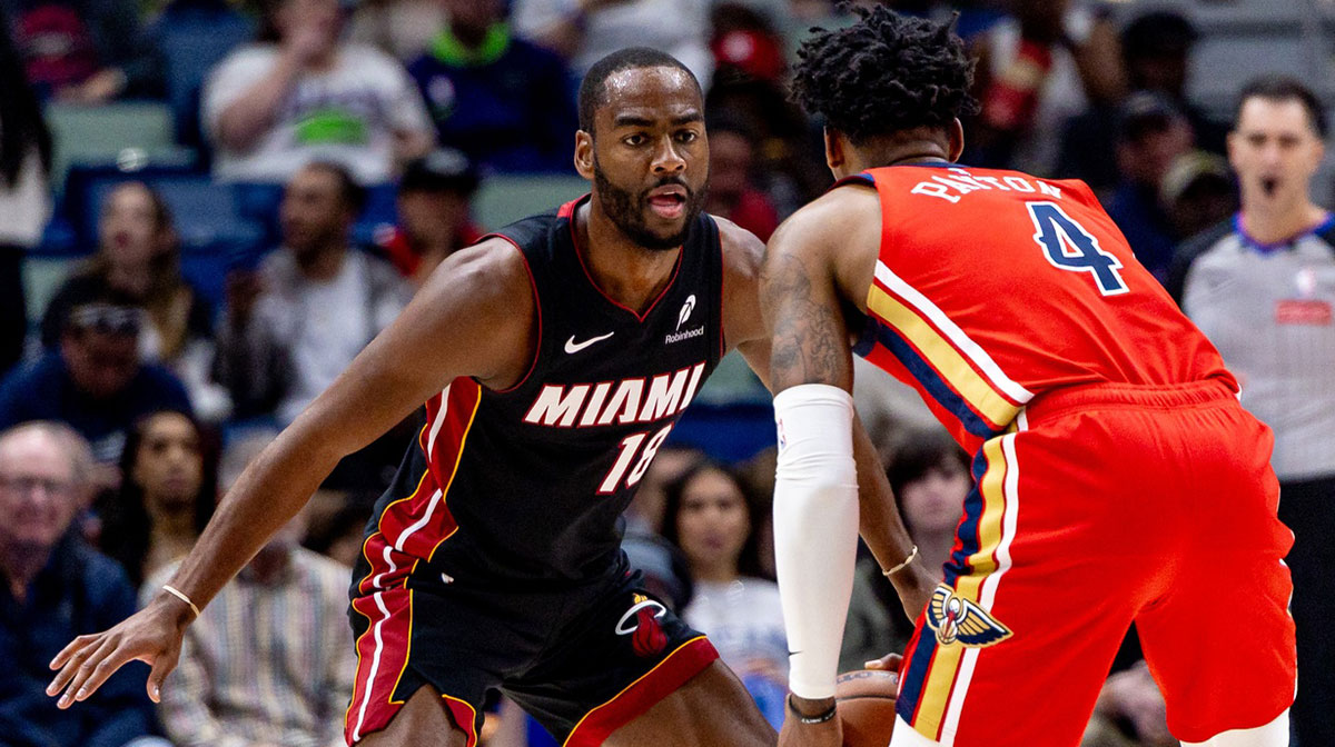 Miami Heat guard Alec Burks (18) guards New Orleans Pelicans guard Elfrid Payton (4) during the first half at Smoothie King Center.