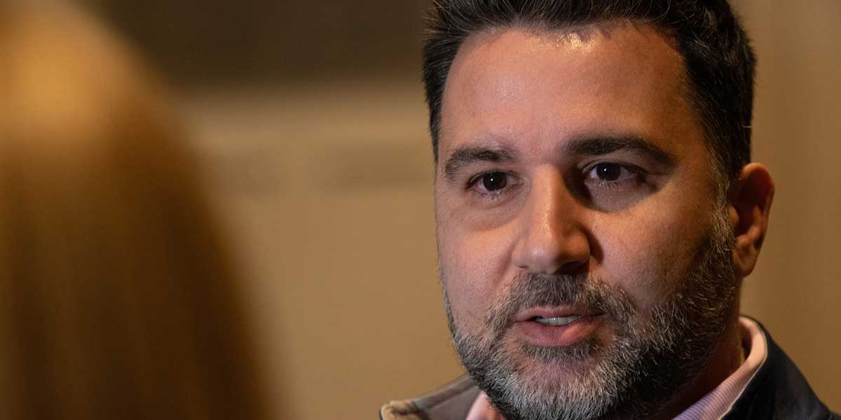 Atlanta Braves general manager Alex Anthopoulos fields questions during the Major League Baseball Winter Meetings.
