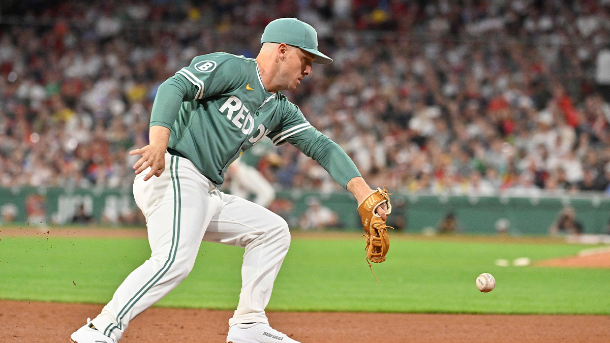 Boston Red Sox third baseman Alex Bregman (2) makes an error at third during the seventh inning against the Atlanta Braves at Fenway Park.