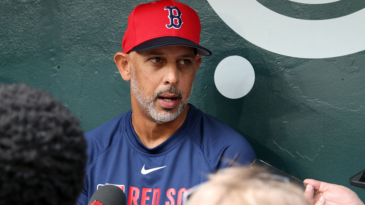 Mar 27, 2025; Arlington, Texas, USA; Boston Red Sox manager Alex Cora (13) talks to the media before the game against the Texas Rangers at Globe Life Field.