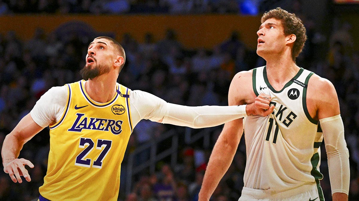 Los Angeles Lakers center Alex Len (27) defends against Milwaukee Bucks center Brook Lopez (11) during the first half at Crypto.com Arena.
