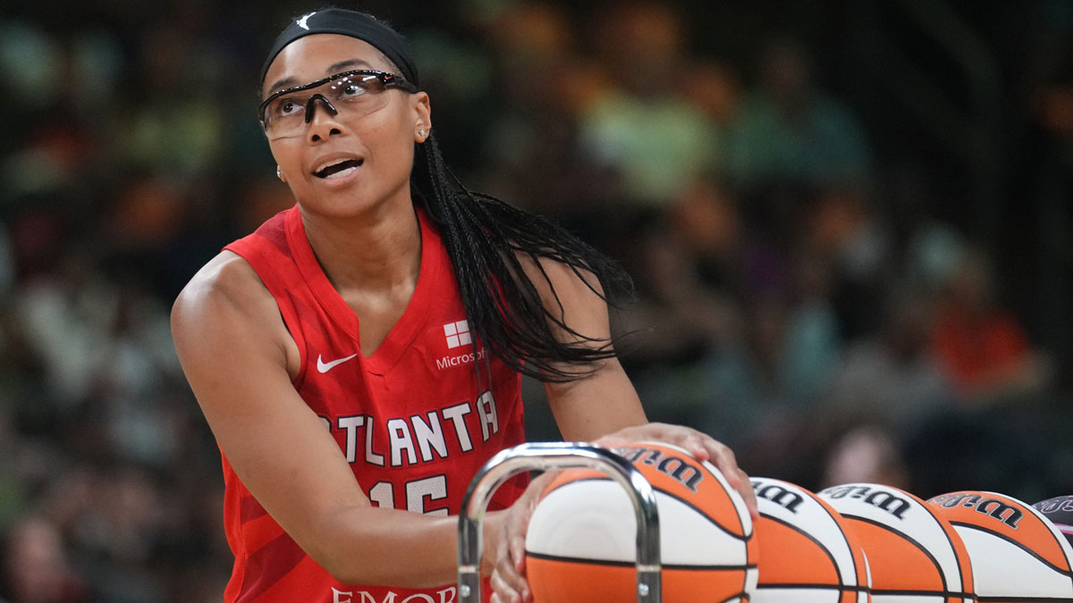 Atlanta Dream guard Allisha Gray gathers a ball during the WNBA All-Star Game 3-point contest at Footprint Center on Friday, July 19, 2024.