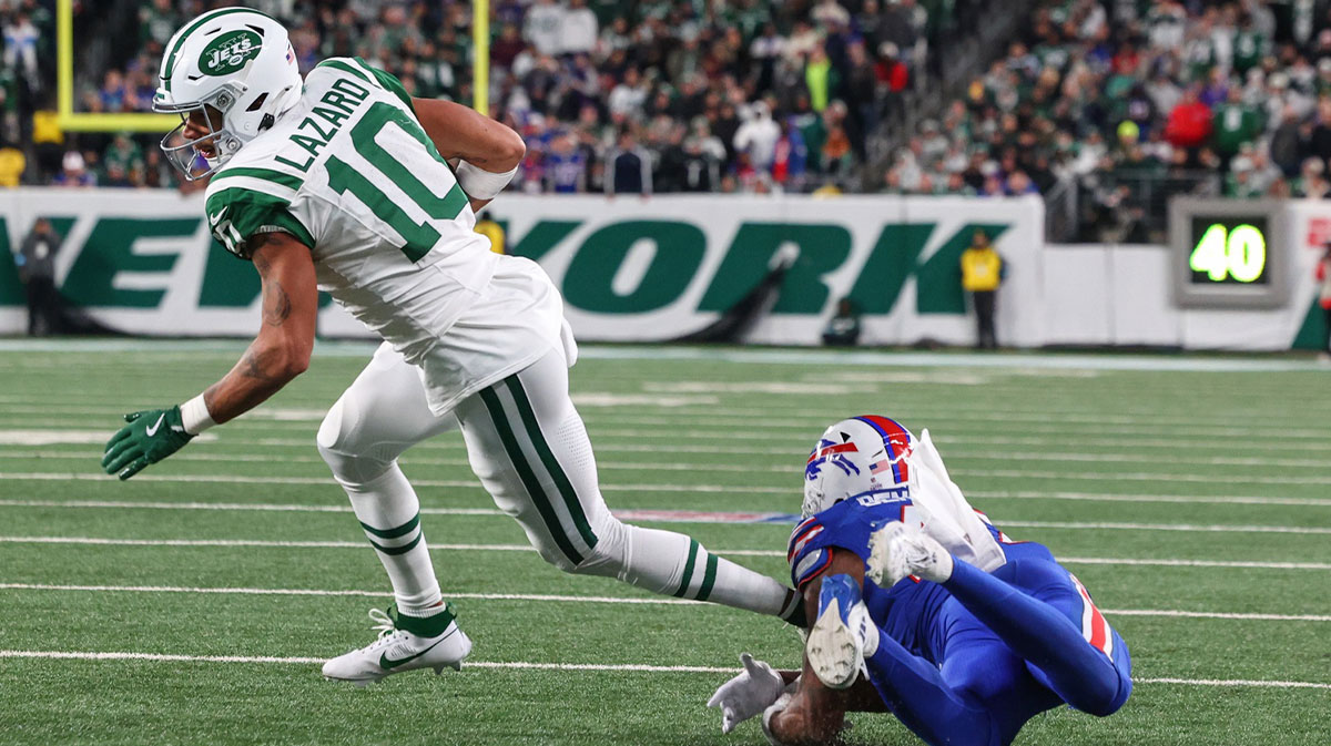 Oct 14, 2024; East Rutherford, New Jersey, USA; New York Jets wide receiver Allen Lazard (10) runs with the ball against the Buffalo Bills during the second half at MetLife Stadium. 