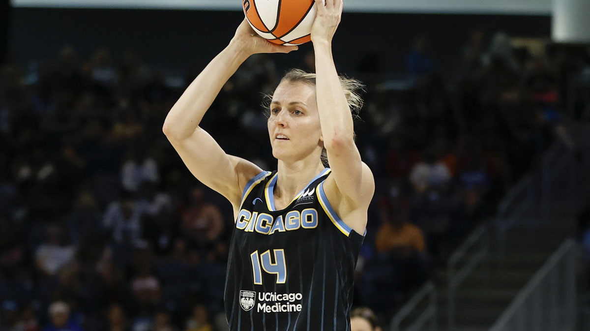 Aug 20, 2022; Chicago, Illinois, USA; Chicago Sky guard Allie Quigley (14) looks to pass the ball against the New York Liberty during the first half of Game 2 of the first round of the WNBA playoffs at Wintrust Arena. Mandatory Credit: Kamil Krzaczynski-Imagn Images