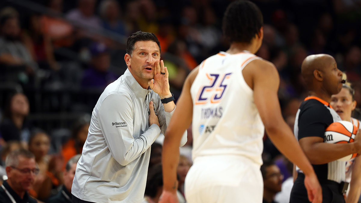 Phoenix Mercury head coach Nate Tibbetts talks to forward Alyssa Thomas (25) against the Golden State Valkyries during a preseason game at PHX Arena.