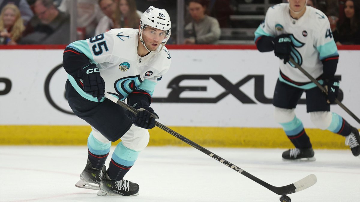 Seattle Kraken left wing Andre Burakovsky (95) skates with the puck during the second period against the Chicago Blackhawks at United Center.