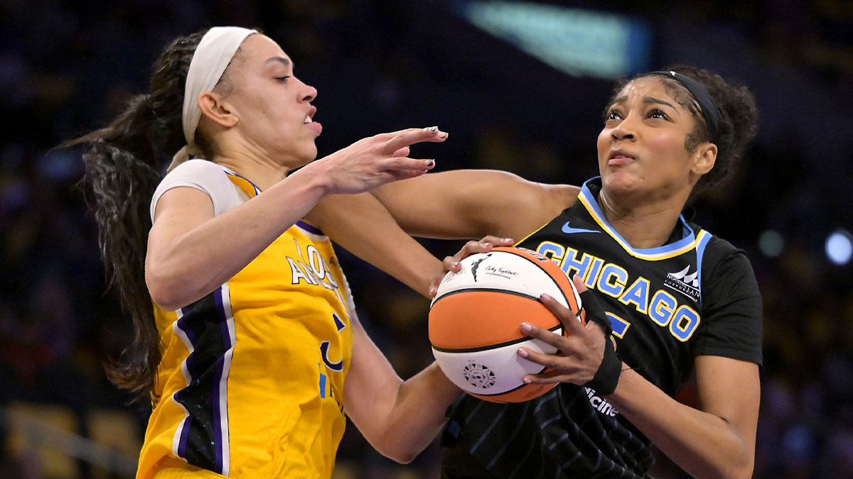Los Angeles Sparks forward Dearica Hamby (5) is fouled by Chicago Sky forward Angel Reese (5) in the second half at Crypto.com Arena.