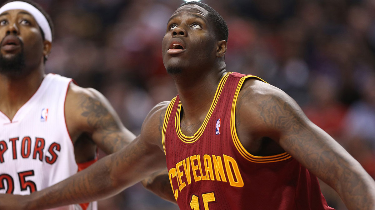Cleveland Cavaliers forward Anthony Bennett (15) watches a free throw next to Toronto Raptors forward John Salmons (25) at Air Canada Centre. The Raptors beat the Cavaliers 98-91.