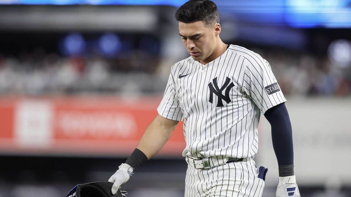 Jun 4, 2025; Bronx, New York, USA; New York Yankees shortstop Anthony Volpe (11) walks back to the field after hitting into an inning ending double play in the seventh inning against the Cleveland Guardians at Yankee Stadium. Mandatory Credit: Wendell Cruz-Imagn Images