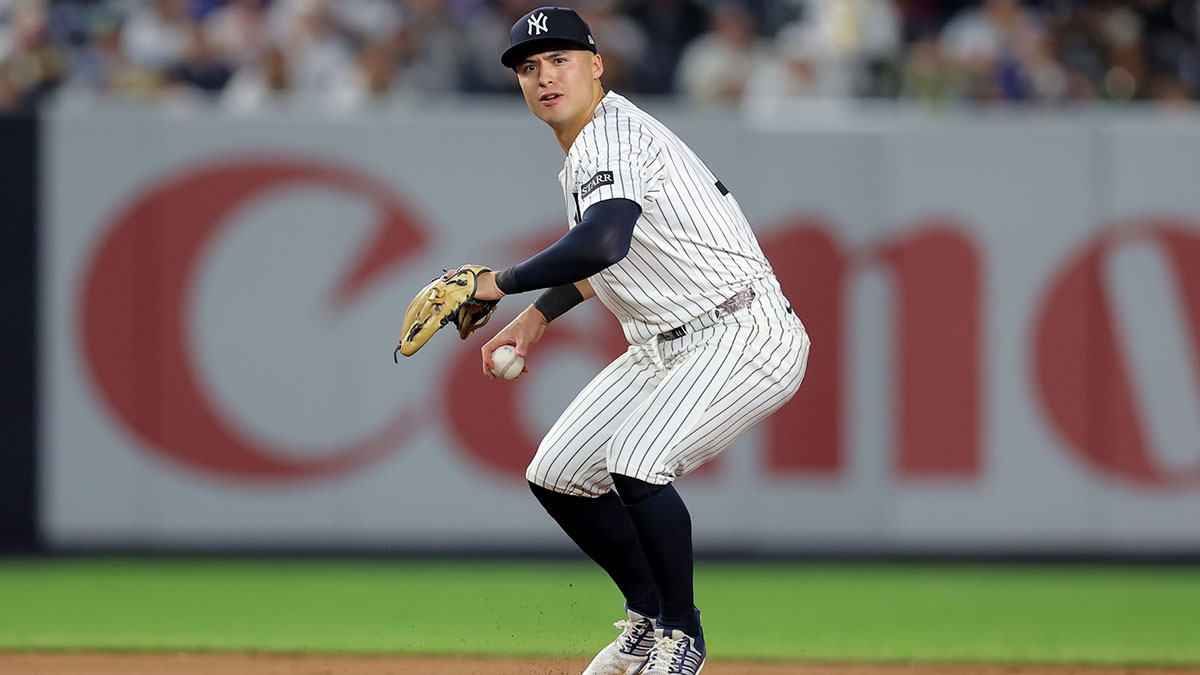 New York Yankees shortstop Anthony Volpe (11) throws out Los Angeles Angels center fielder Jo Adell (not pictured) on a ground ball during the eighth inning at Yankee Stadium.
