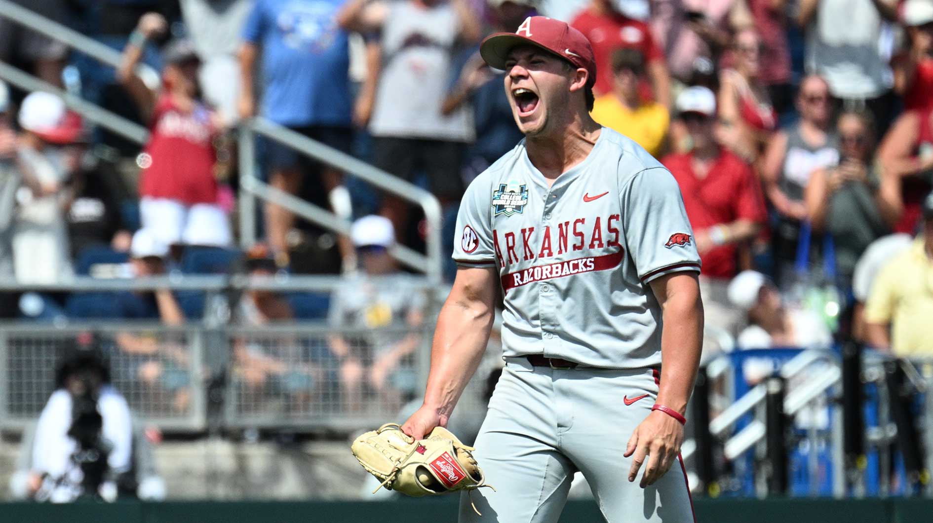 Arkansas Razorbacks starting pitcher Gage Wood (14) celebrates completing a no hitter against the Murray State Racers at Charles Schwab Field.