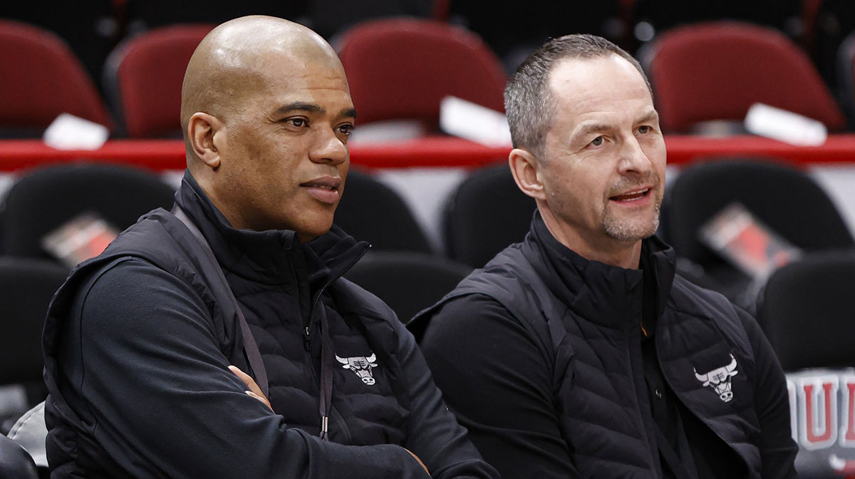 Chicago Bulls executive vice president of basketball operations Arturas Karnisovas (right) talks with general manager Marc Eversley (left) before game three of the first round for the 2022 NBA playoffs against the Milwaukee Bucks at United Center