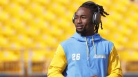 Los Angeles Chargers cornerback Asante Samuel Jr. (26) walks the field before playing the Pittsburgh Steelers at Acrisure Stadium.