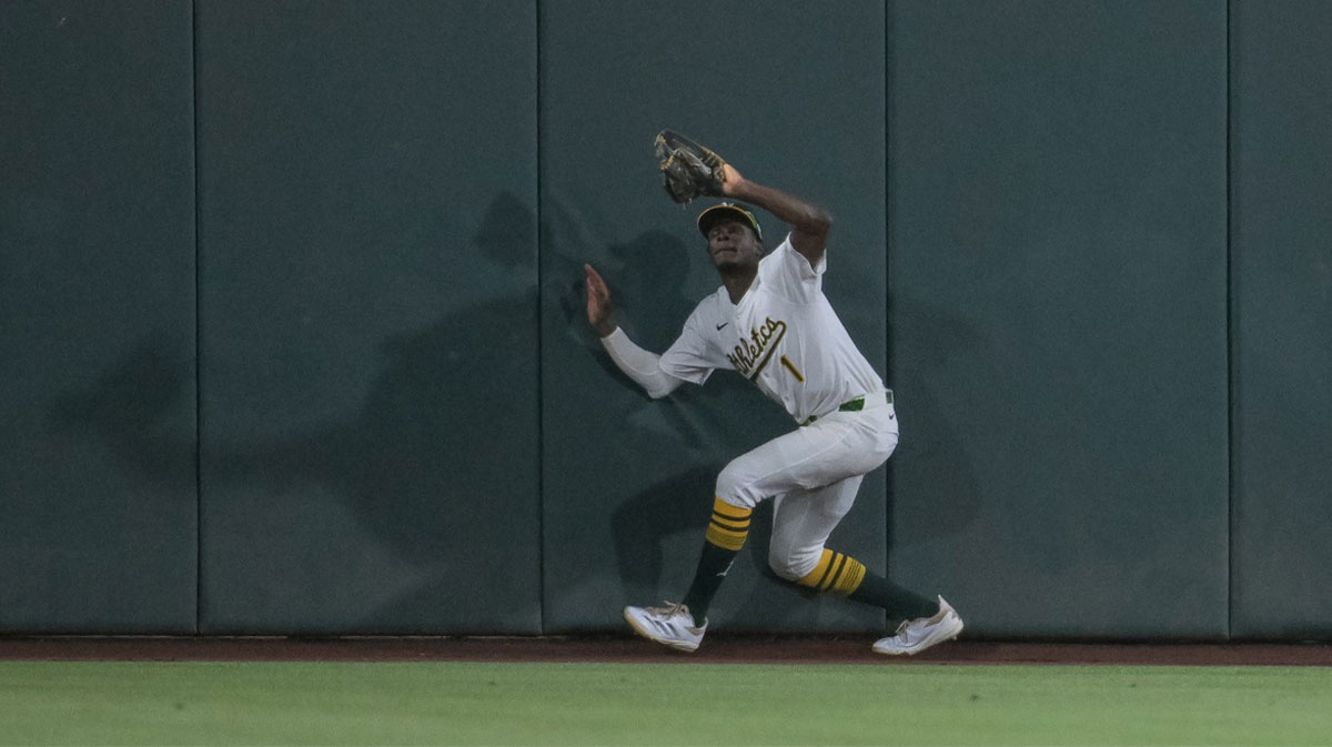 Athletics outfielder Denzel Clarke (1) makes the catch in center field during the sixth inning of the game against the Minnesota Twins at Sutter Health Park.