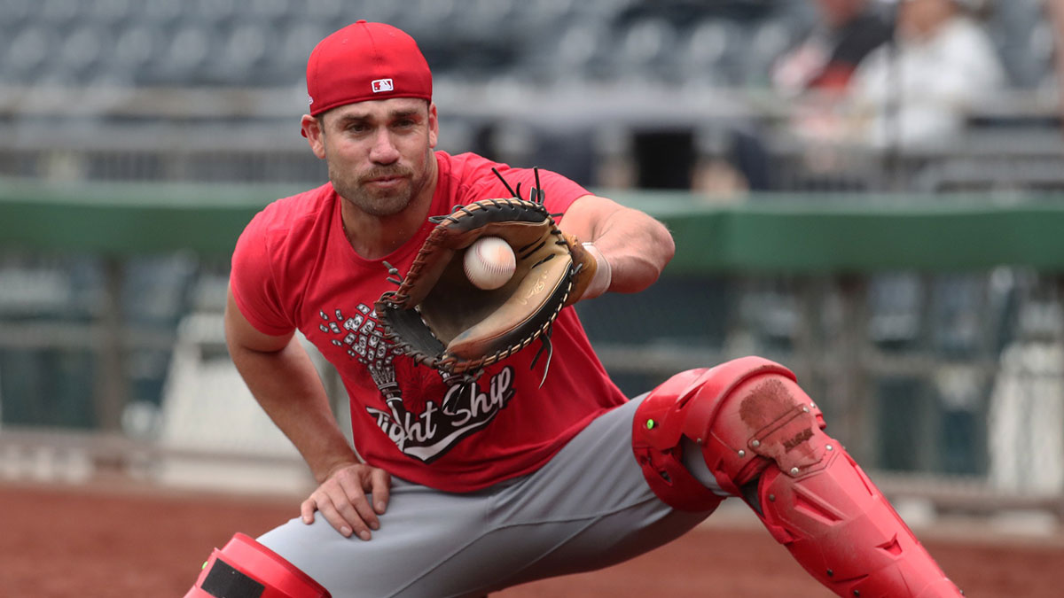 Cincinnati Reds catcher Austin Wynns (38) warms up before the game against the Pittsburgh Pirates at PNC Park.