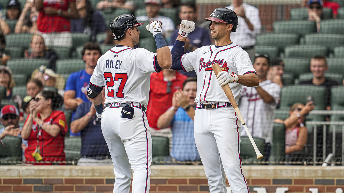 Atlanta Braves third baseman Austin Riley (27) reacts with first baseman Matt Olson (28) after hitting a home run against the Arizona Diamondbacks during the fifth inning at Truist Park. Ken Rosenthal