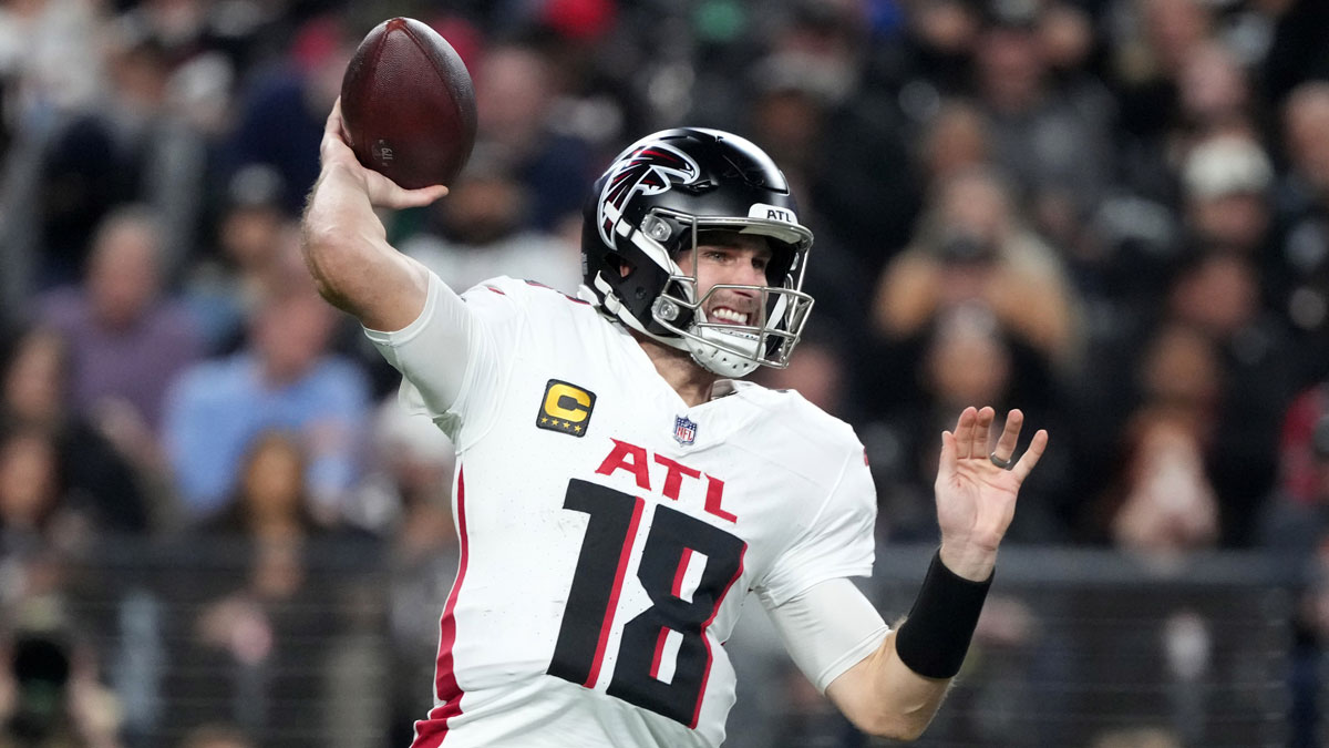 Atlanta Falcons quarterback Kirk Cousins (18) throws the ball against the Las Vegas Raiders in the first half at Allegiant Stadium.