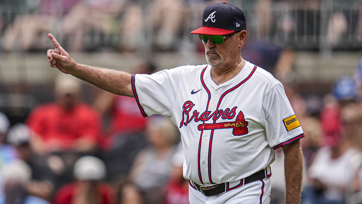 Jun 5, 2025; Cumberland, Georgia, USA; Atlanta Braves manager Brian Snitker (43) walks to the pitchers mound to change pitchers against the Arizona Diamondbacks during the ninth inning at Truist Park.