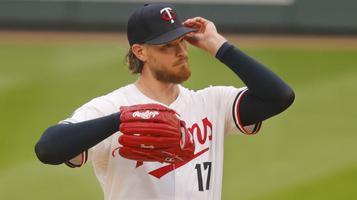 Minnesota Twins starting pitcher Bailey Ober (17) awaits the manager to get pulled from throwing to the Texas Rangers in the fifth inning.