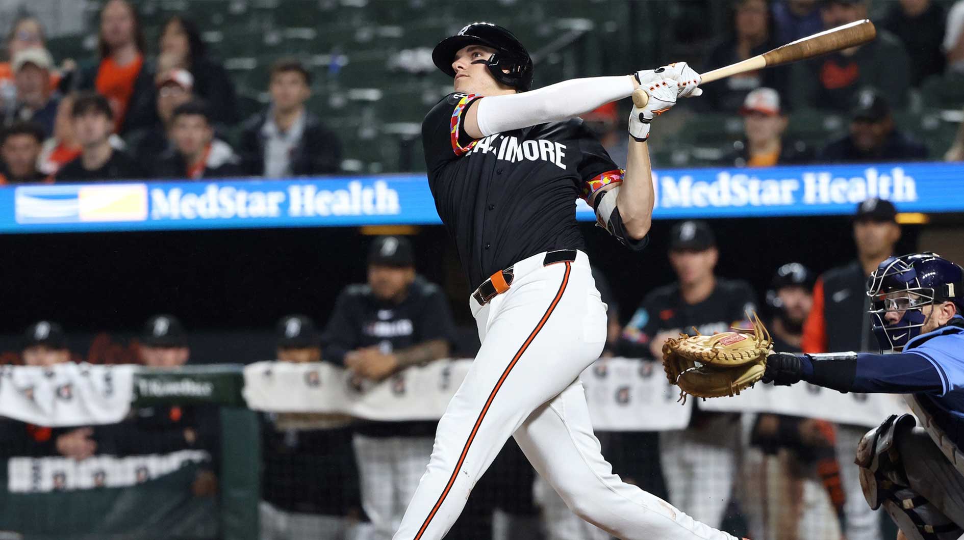 Baltimore Orioles third baseman Coby Mayo (16) hits a home run during the eighth inning against the Tampa Bay Rays at Oriole Park at Camden Yards.
