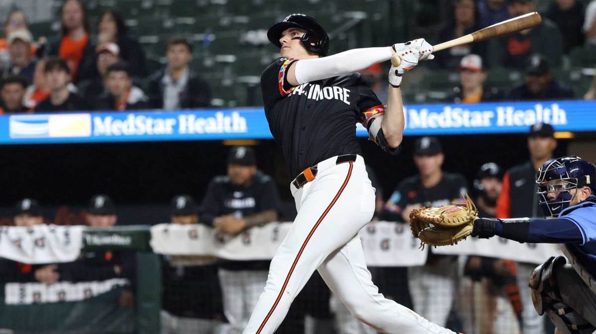 Baltimore Orioles third baseman Coby Mayo (16) hits a home run during the eighth inning against the Tampa Bay Rays at Oriole Park at Camden Yards.