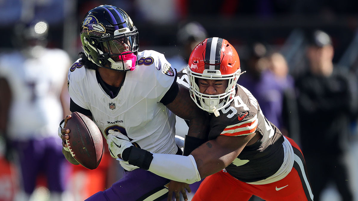 Cleveland Browns defensive end Ogbo Okoronkwo (54) sacks Baltimore Ravens quarterback Lamar Jackson (8) on Oct. 27, 2024, in Cleveland, Ohio.