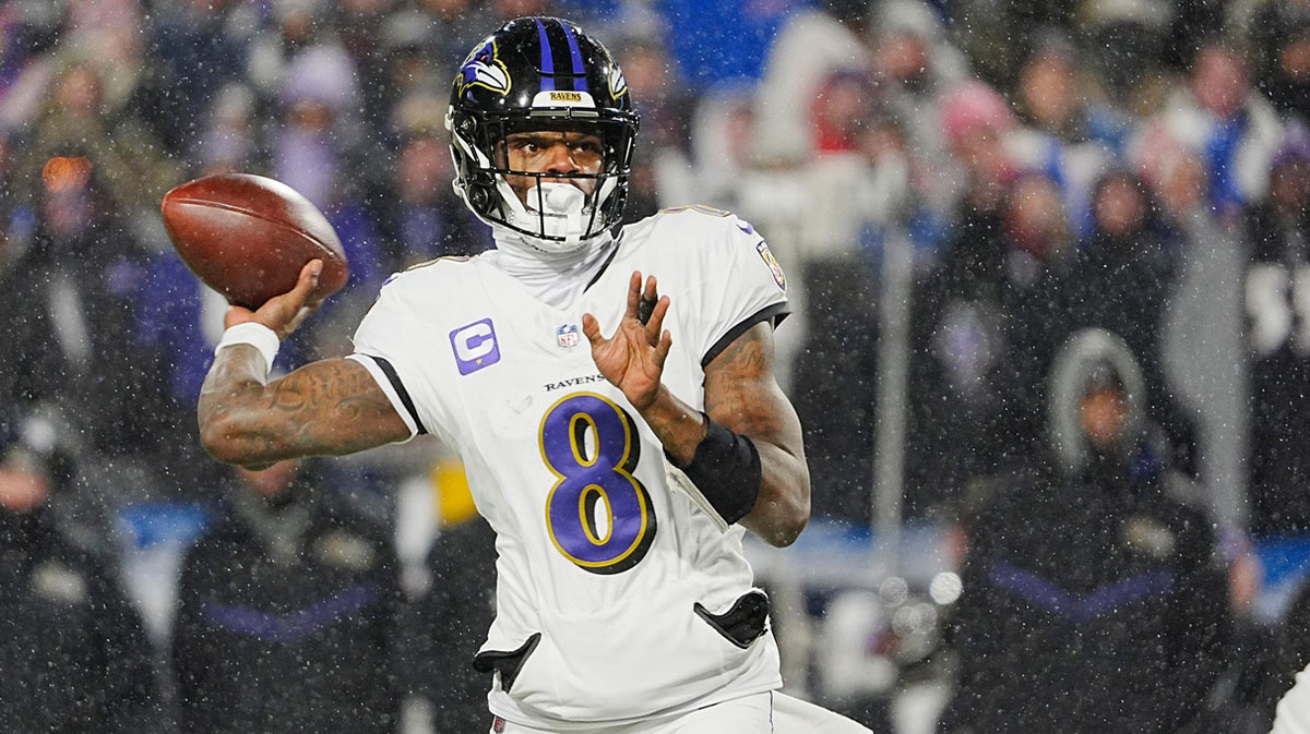 Baltimore Ravens quarterback Lamar Jackson gets off a pass during first half action during the Buffalo Bills divisional game against the Baltimore Ravens at Highmark Stadium in Orchard Park.