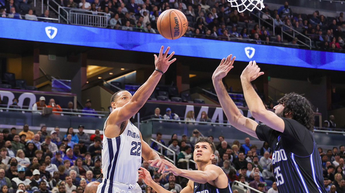 Memphis Grizzlies guard Desmond Bane (22) goes to the basket against Orlando Magic forward Tristan da Silva (23) during the second half at Kia Center.