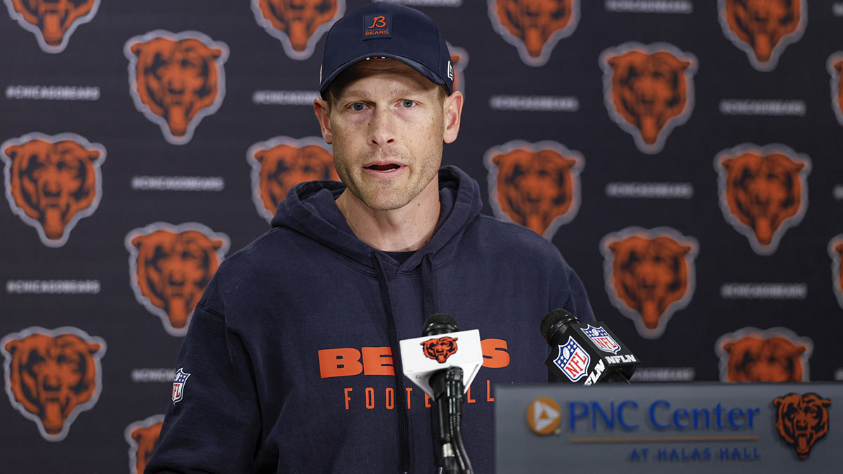 Chicago Bears head coach Ben Johnson (R) speaks during the Rookie Minicamp at Halas Hall.