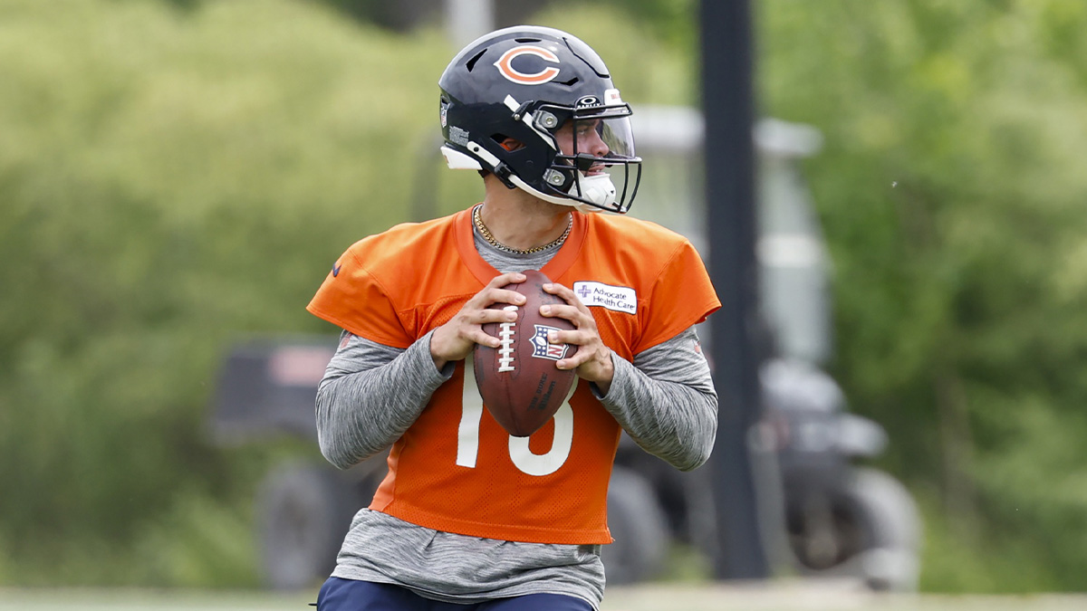 Jun 3, 2025; Lake Forest, IL, USA; Chicago Bears quarterback Caleb Williams (18) looks to pass the ball during minicamp at Halas Hall. Mandatory Credit: Kamil Krzaczynski-Imagn Images