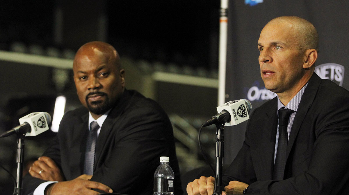 Brooklyn Nets general manager Billy King (left) listens as head coach Jason Kidd speaks during a press conference at Barclays Center.