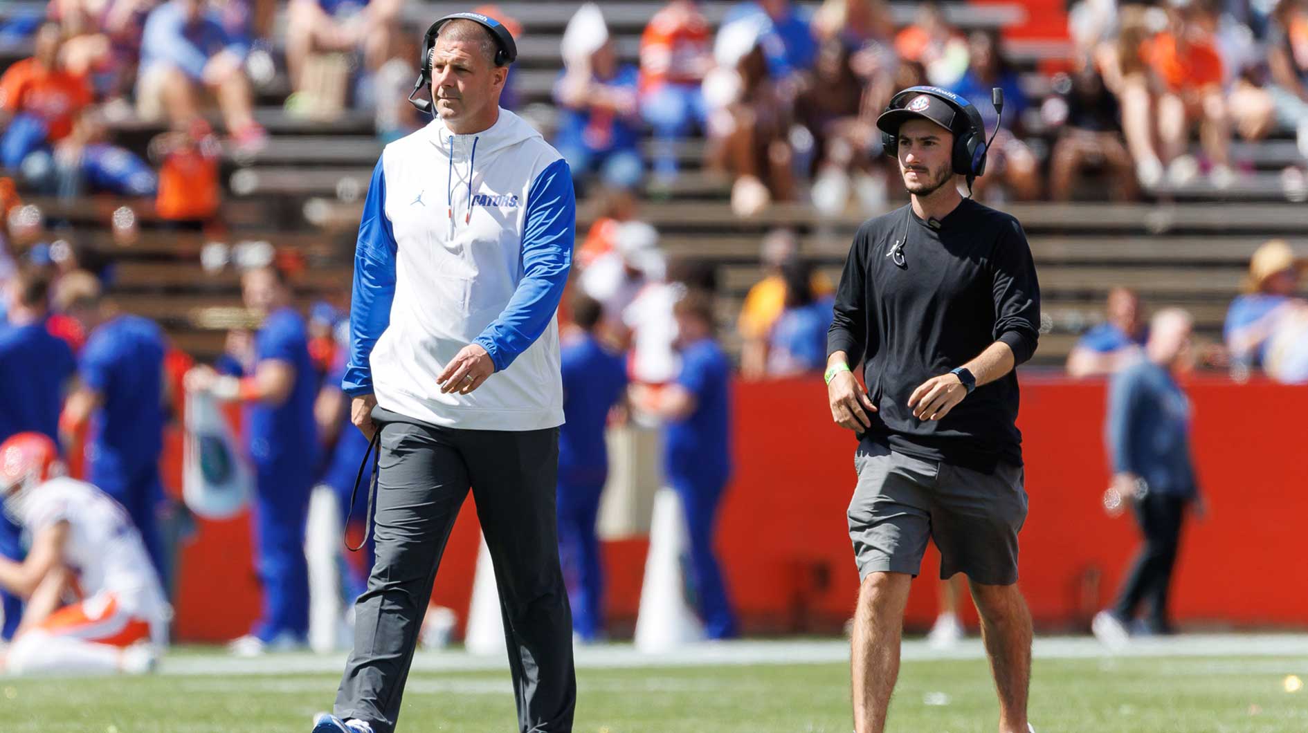 Florida Gators head coach Billy Napier walks on the field during the second half at Ben Hill Griffin Stadium.