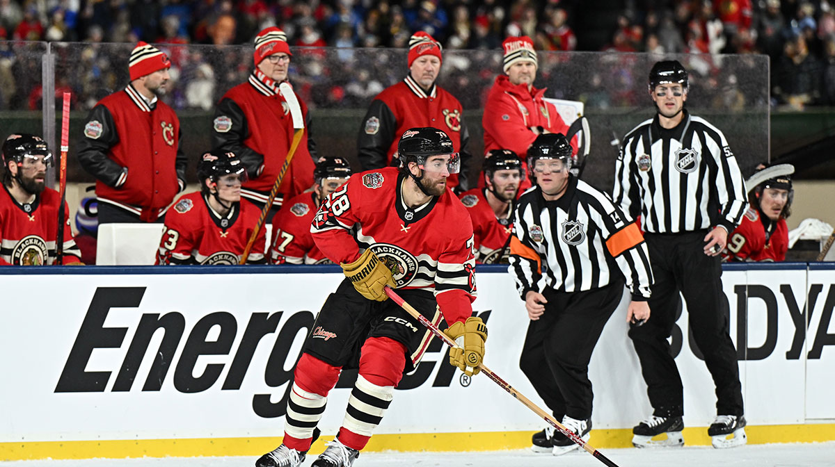 Chicago Blackhawks defenseman TJ Brodie (78) skates with the puck against the St. Louis Blues during the first period in the Winter Classic at Wrigley Field.