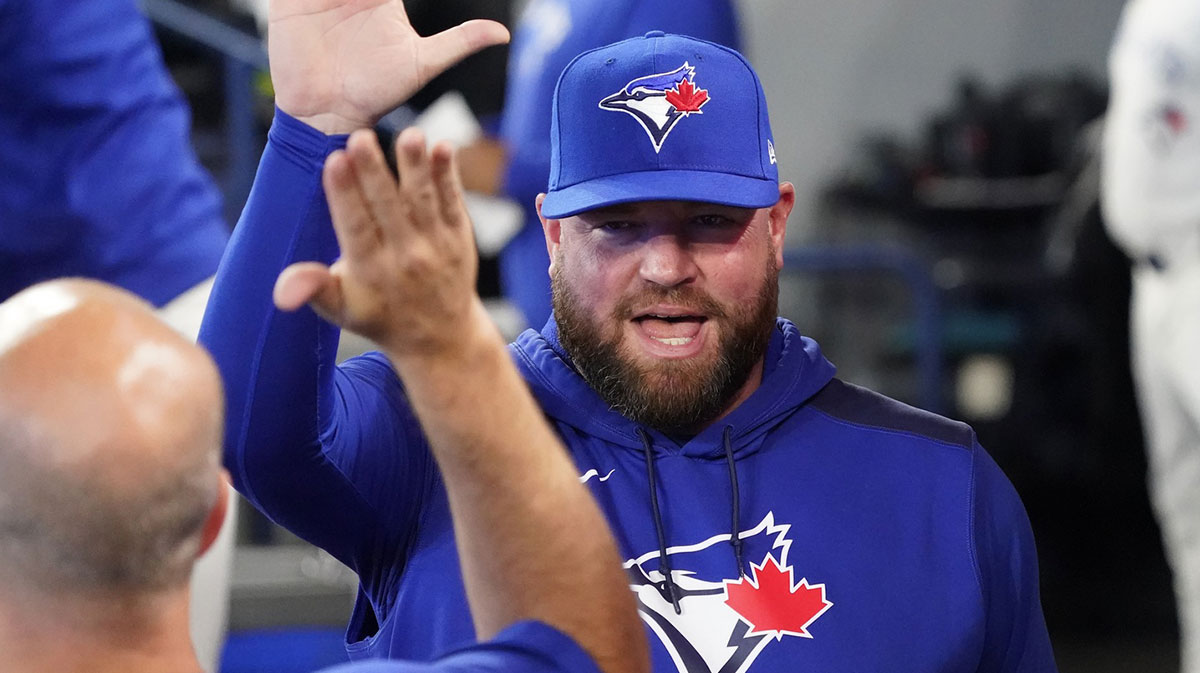 Toronto Blue Jays manager John Schneider in the dugout before a game against the Philadelphia Phillies at Rogers Centre.