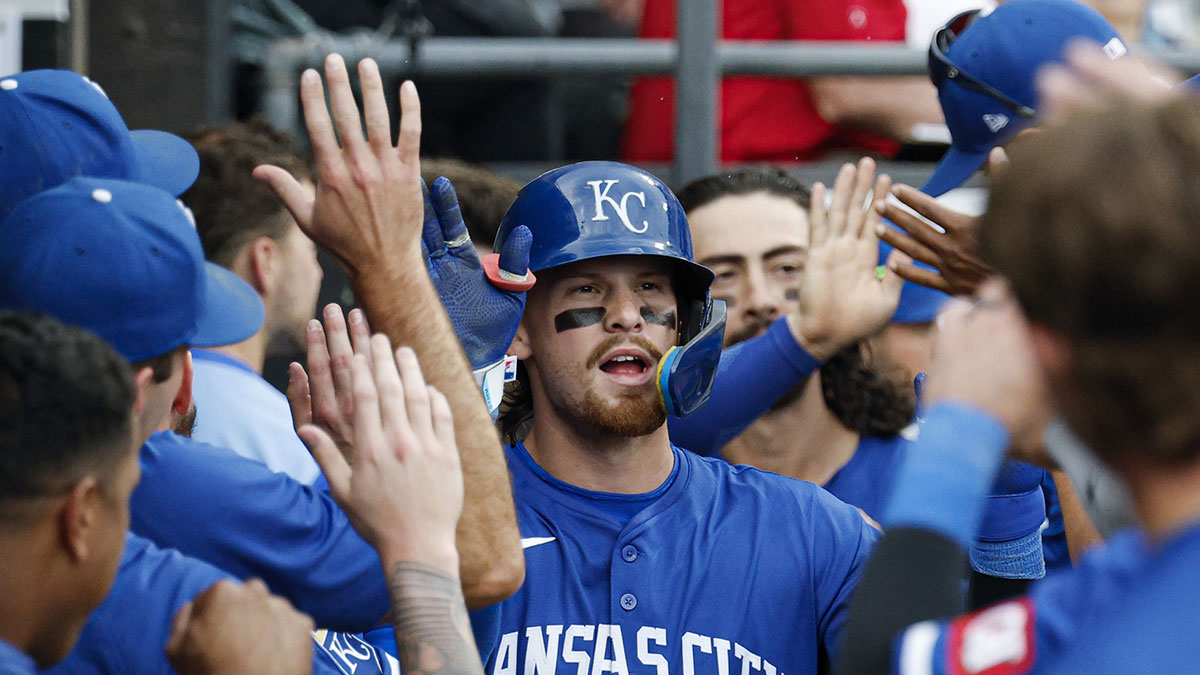 Kansas City Royals designated hitter Bobby Witt Jr. (7) celebrates with teammates in the dugout after hitting a two-run home run against the Chicago White Sox during the ninth inning at Rate Field.