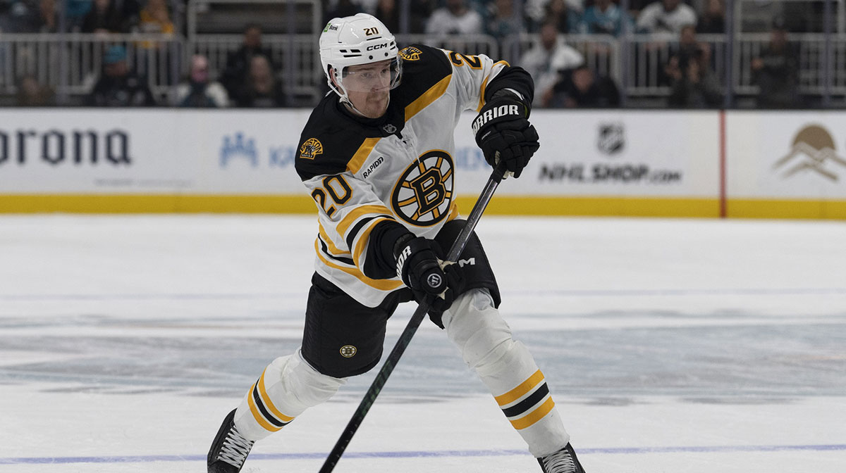 Boston Bruins defenseman Henri Jokiharju (20) shoots the puck during the first period against the San Jose Sharks at SAP Center at San Jose