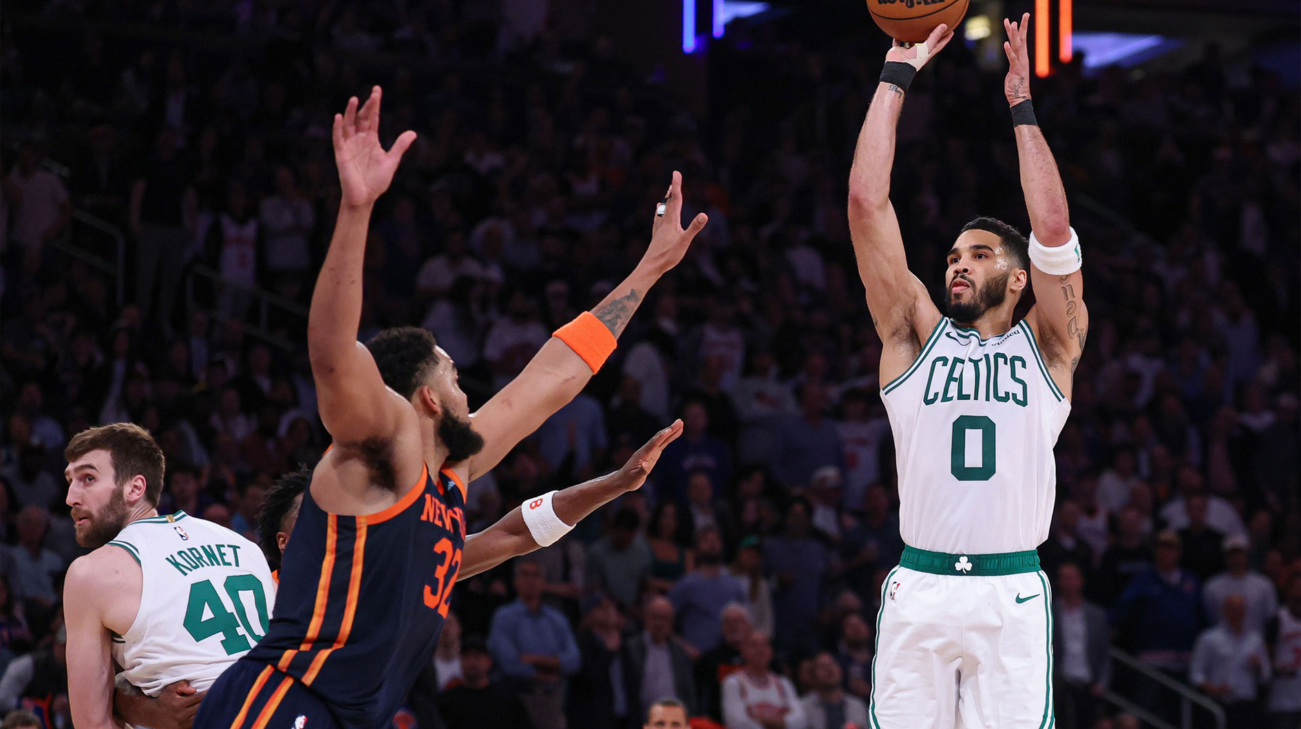 Boston Celtics forward Jayson Tatum (0) shoots the ball as New York Knicks center Karl-Anthony Towns (32) defends in the second half during game four of the second round for the 2025 NBA Playoffs at Madison Square Garden.