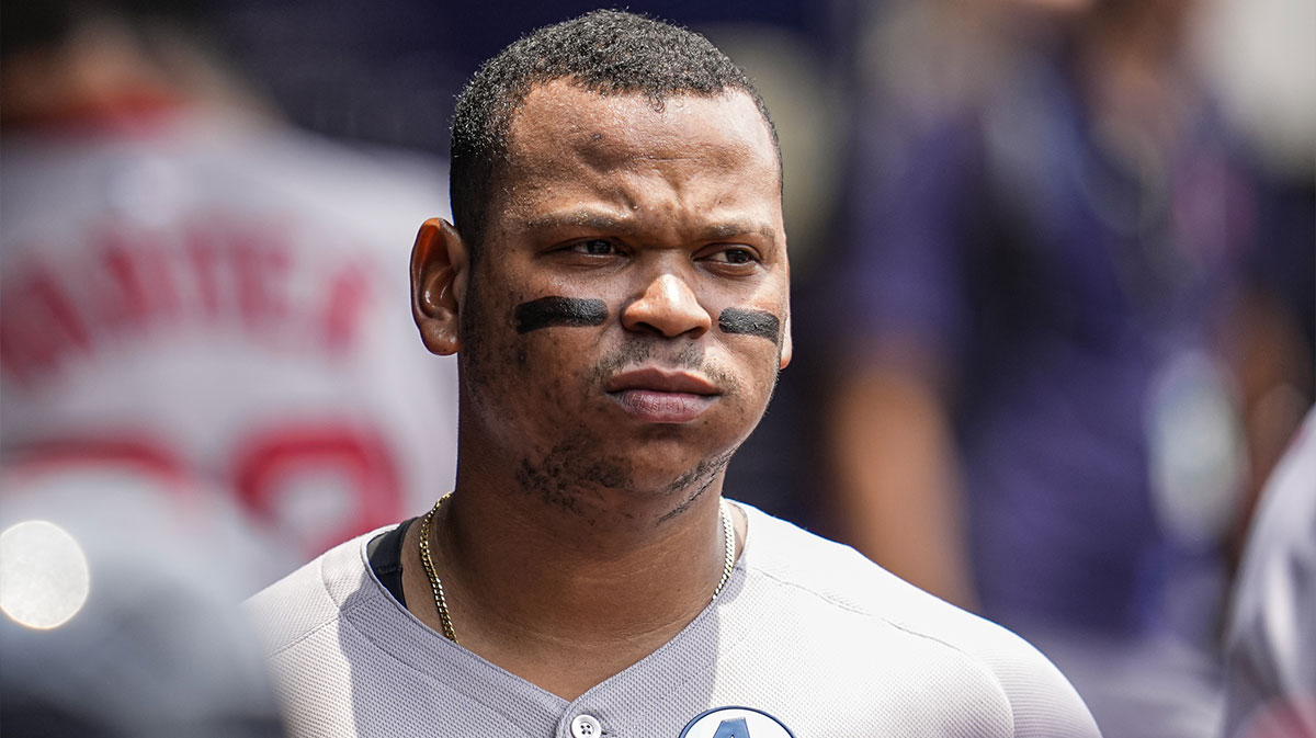 Boston Red Sox designated hitter Rafael Devers (11) shown in the dugout before the game against the Atlanta Braves at Truist Park.