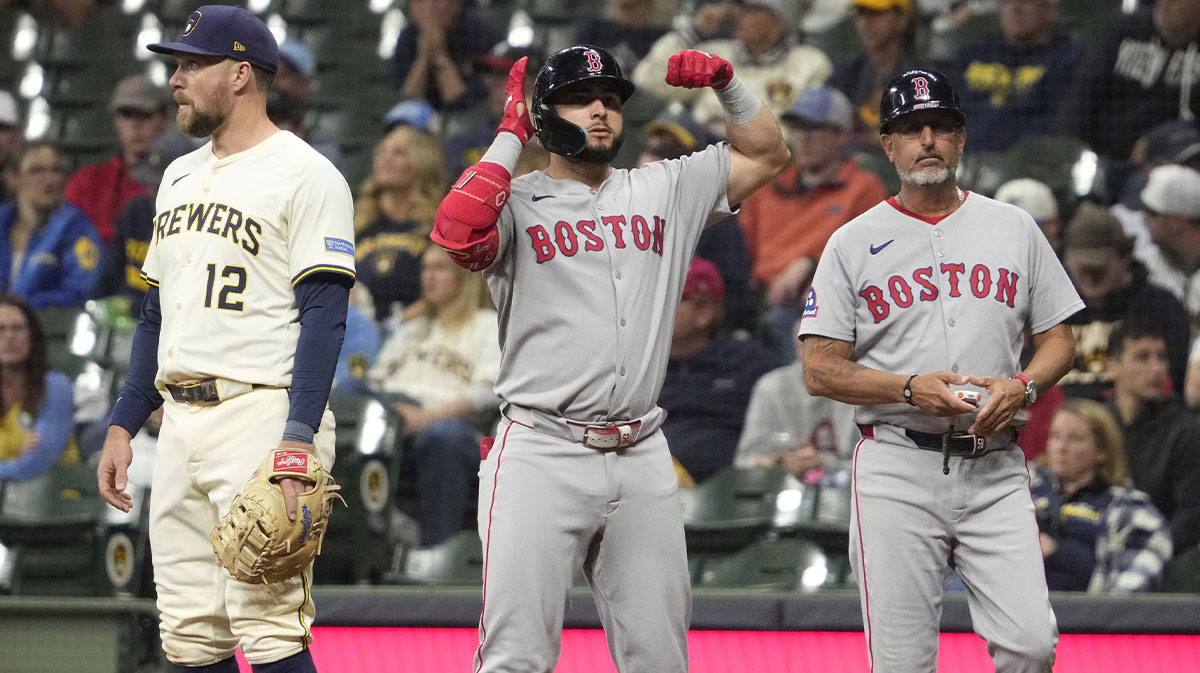 Boston Red Sox outfielder Wilyer Abreu (52) looks back at the dug out to celebrate a base hit against the Milwaukee Brewers in the ninth inning at American Family Field.
