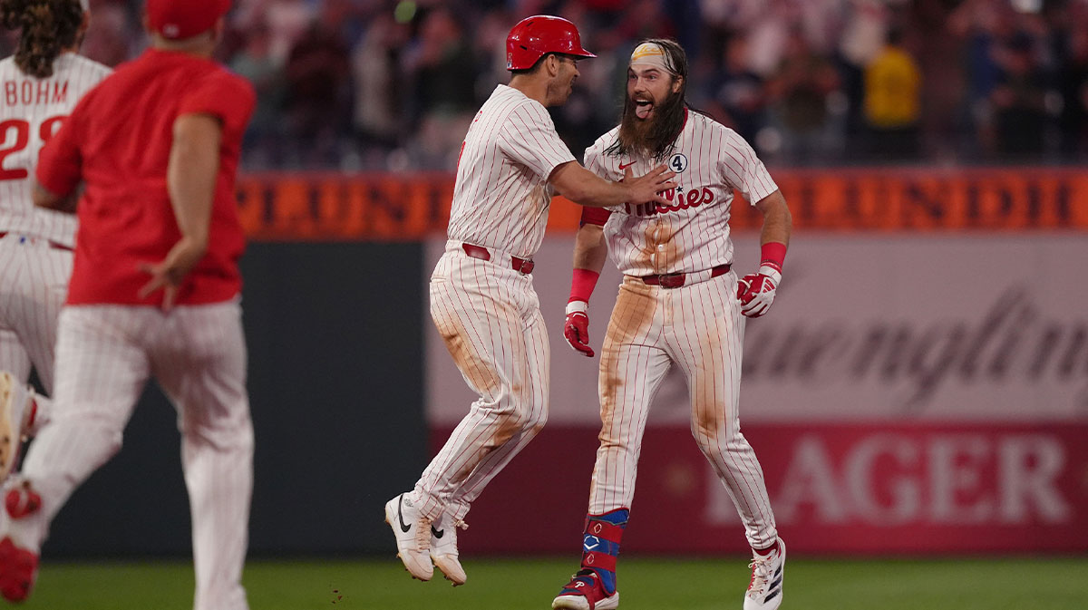 Philadelphia Phillies outfielder Brandon Marsh (16) celebrates with teammates after hitting an RBI single against the Chicago Cubs.