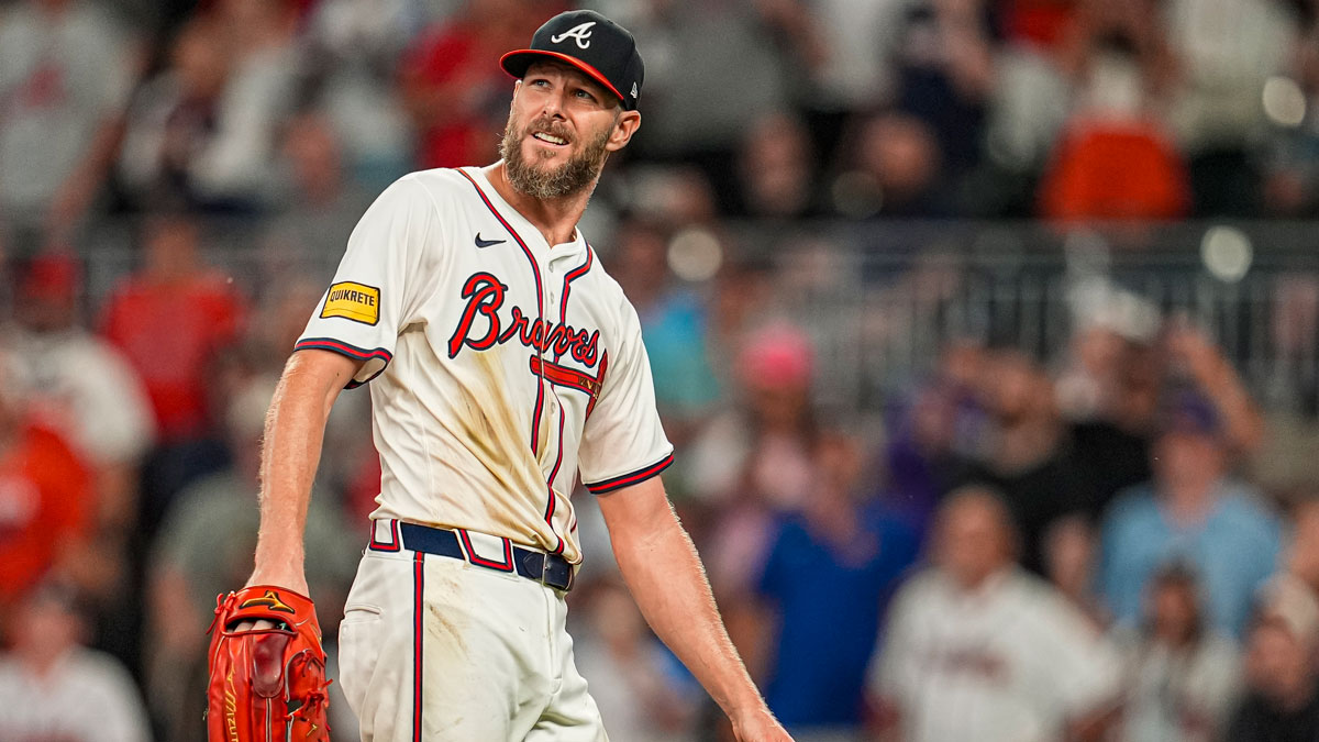 Atlanta Braves starting pitcher Chris Sale (51) watches the ball after a hit by the New York Mets during the ninth inning at Truist Park.