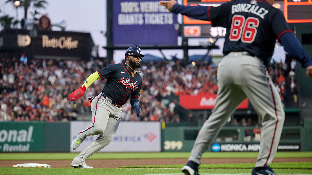 Atlanta Braves designated hitter Marcell Ozuna Jr (20) runs toward home plate against the San Francisco Giants during the fourth inning at Oracle Park.