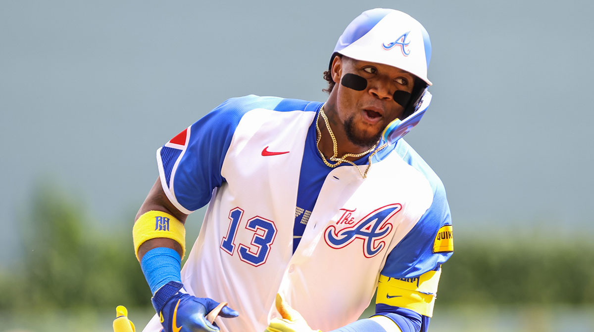 Atlanta Braves outfielder Ronald Acuna Jr. (13) celebrates hitting a home run against the Colorado Rockies during the second inning at Truist Park.